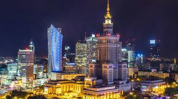A photo of Warsaw by night